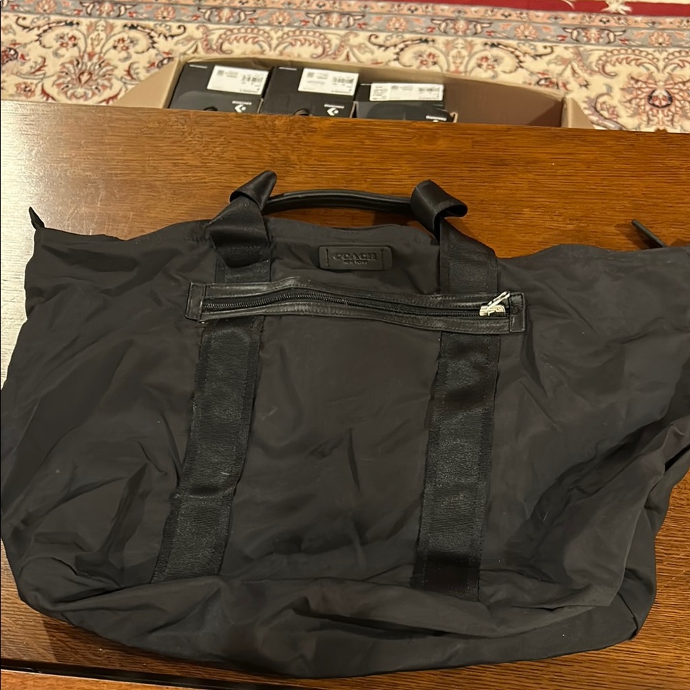 Coach Black Duffel Bag with Multiple Compartments